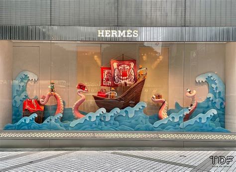 visual merchandising hermes window display|woman behind hermes window.